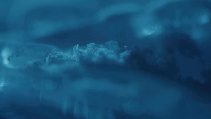 Ice crystals form on a metallic surface