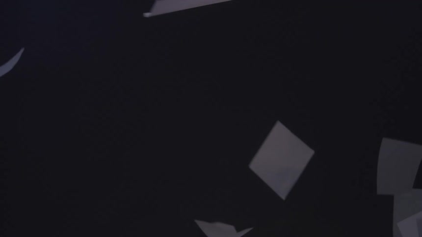 Loose sheets of paper fall in different directions in the air