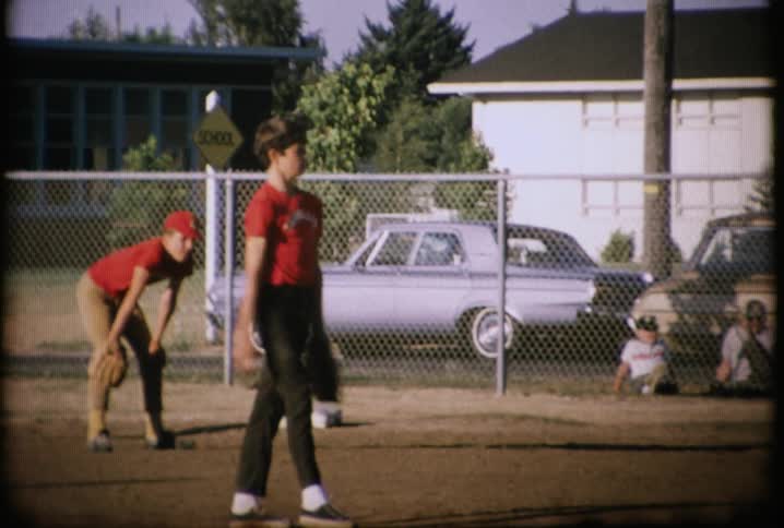 A baseball player throws out a pitch