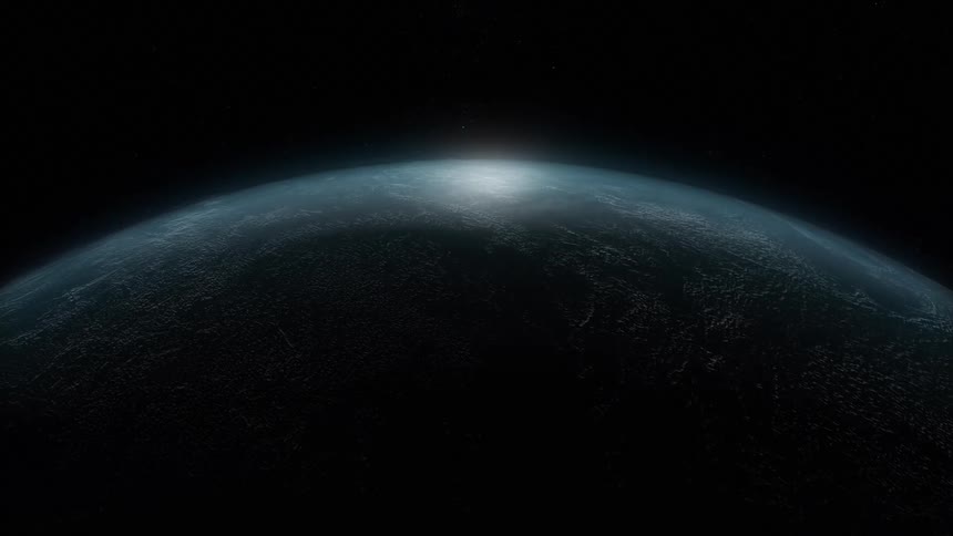 The sun reflects on the rotating planet