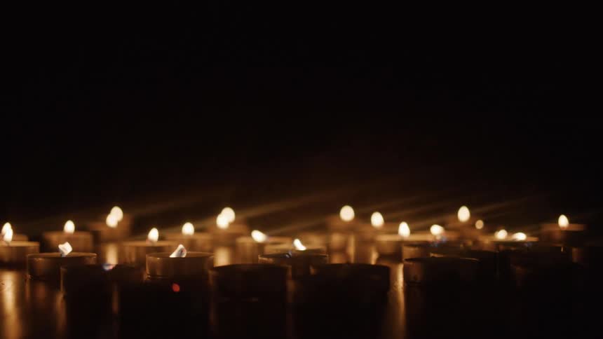 Several small candles are blown out
