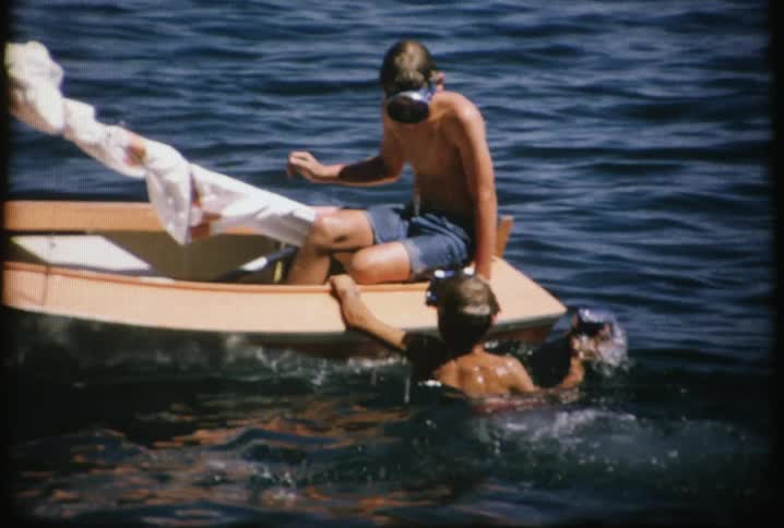 Kids are playing on a small boat