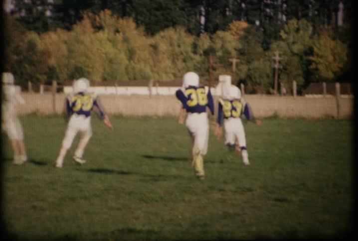 Kids playing football