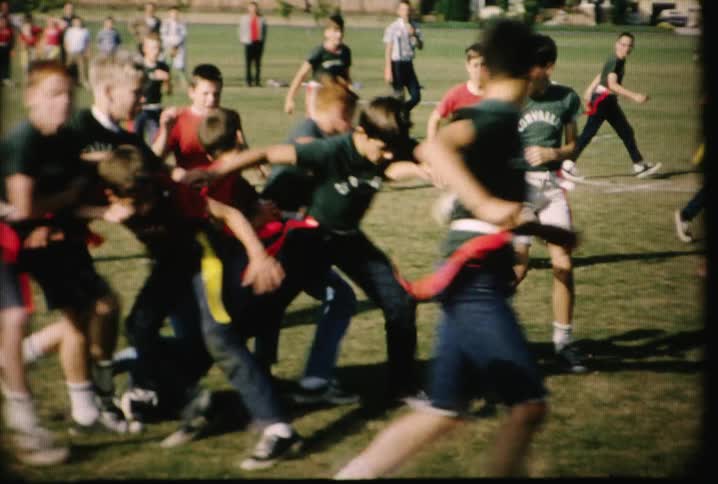 Kids are playing flag football together