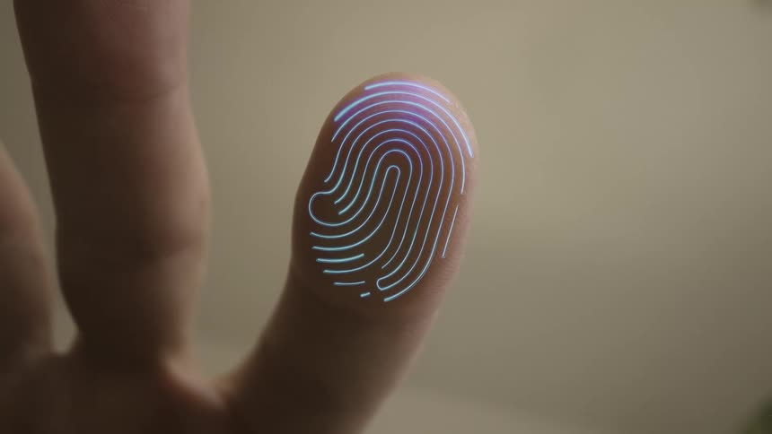 A glowing digital fingerprint scan is displayed on the tip of an extended finger against a neutral background