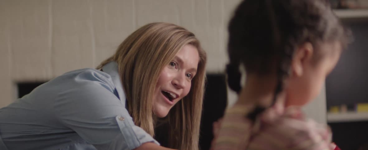 A mother is talking with her daughter
