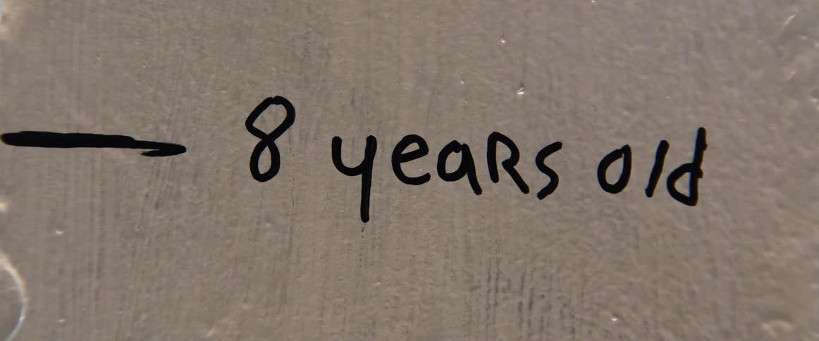A growth chart written on a wall