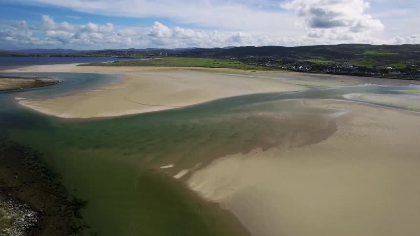 Water is gathered around this coastline on a cloudy day