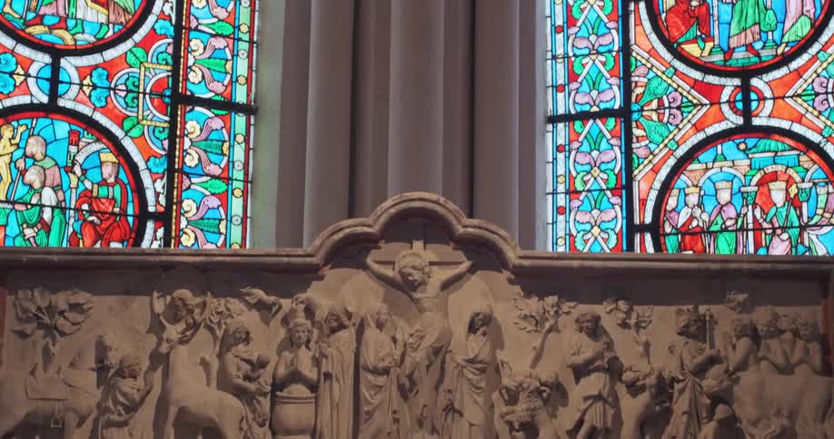 Interior of a church with decorated windows and marble art