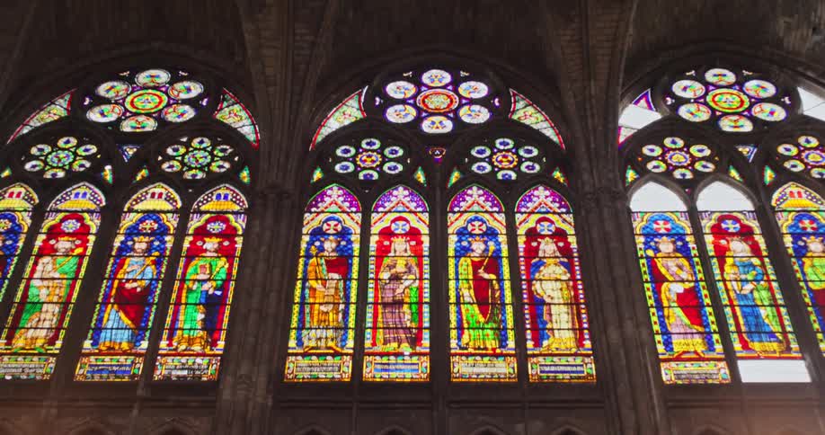 A church cathedral building with many artistic windows