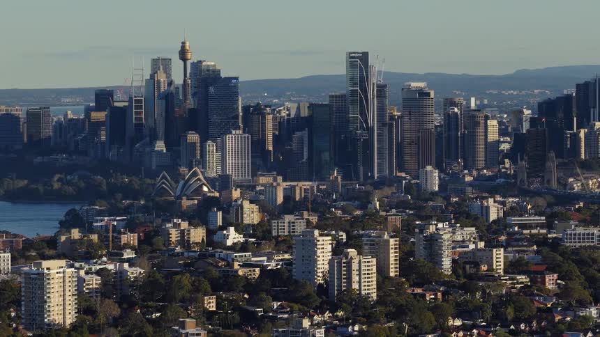 Aerial view of the city at midday with many buildings skyscrapers iconic landmarks and vibrant culture