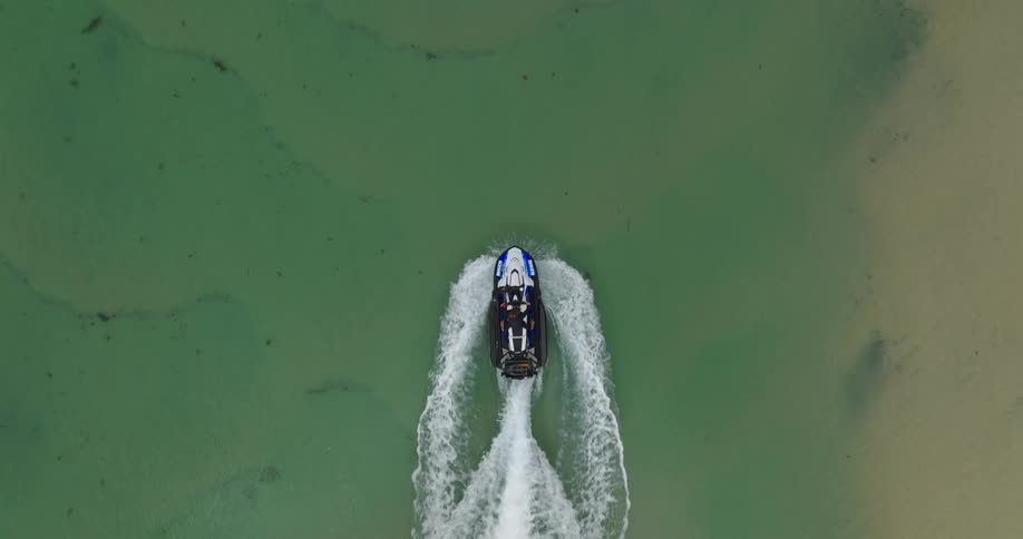 A speedboat going through water