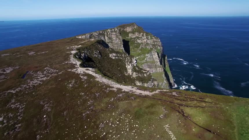 Tall cliffs are lined with long bodies of water