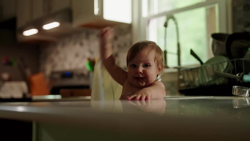 Little girl playing in the kitchen