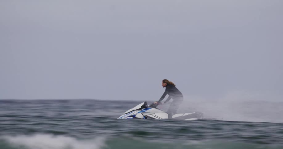 Person riding a jet ski on the ocean