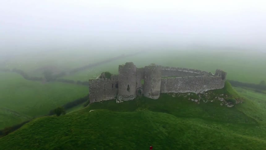 Heavy fog is covering the hilltops below