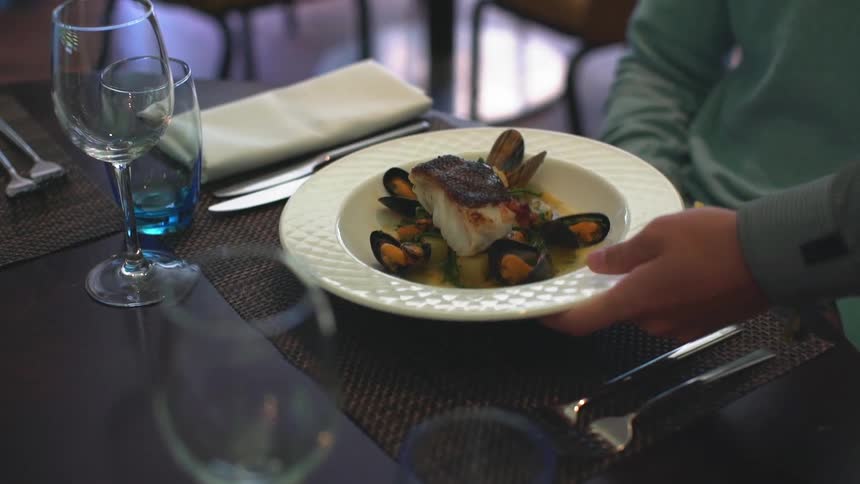 Food is set on a plate for a person
