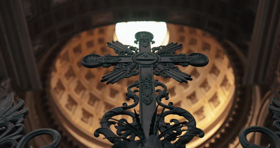 Looking up at a cross