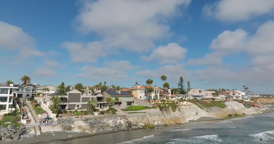 Mansions sit along the coast