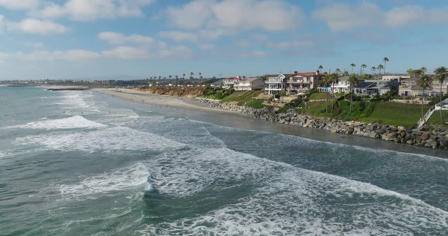 Mansions sit along the coast