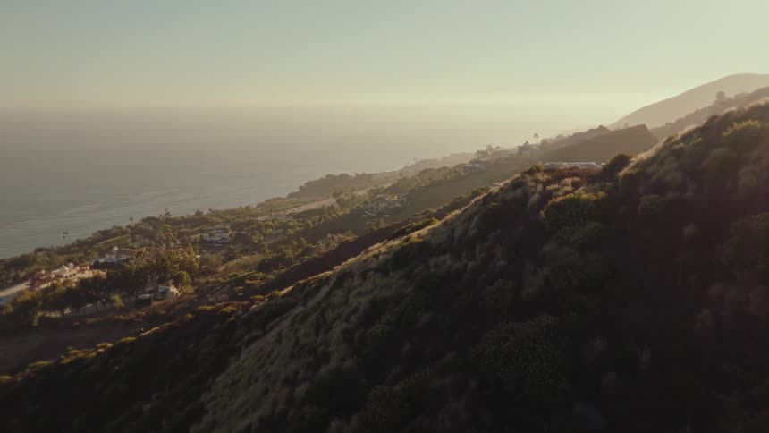 Aerial landscape of mountains by the sea
