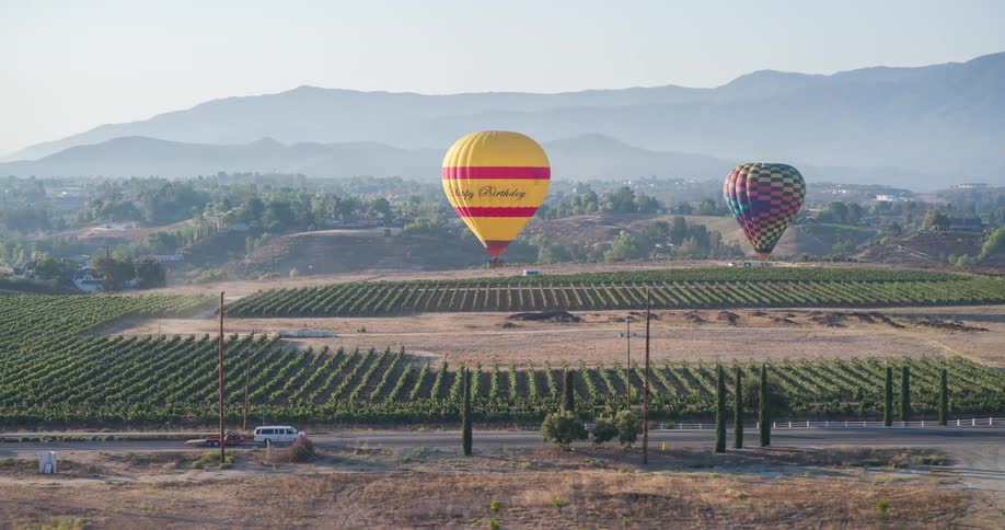 Balloons at low levels near an agricultural area