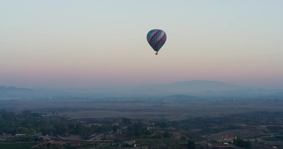 Colorful balloon flying in the late afternoon
