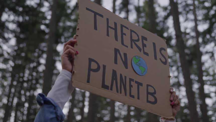 A sign that reads there is no planet b