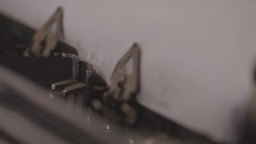 Extreme close up of a typewriter in use