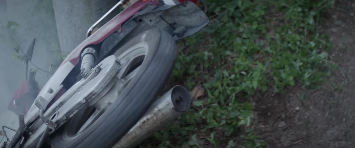 A motorcycle wheel is spinning