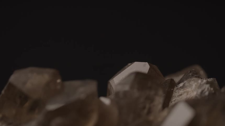 Close up of rock crystals in a dark room