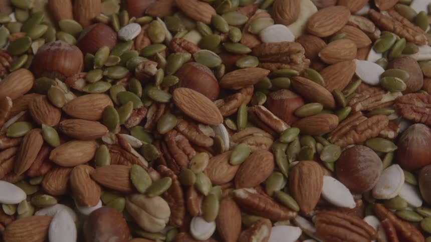 A closeup view of assorted nuts and seeds