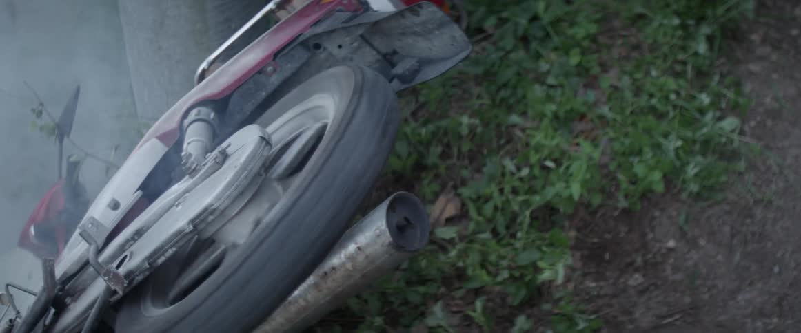 A motorcycle wheel is spinning