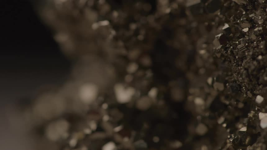 A close up of a shiny rocky texture
