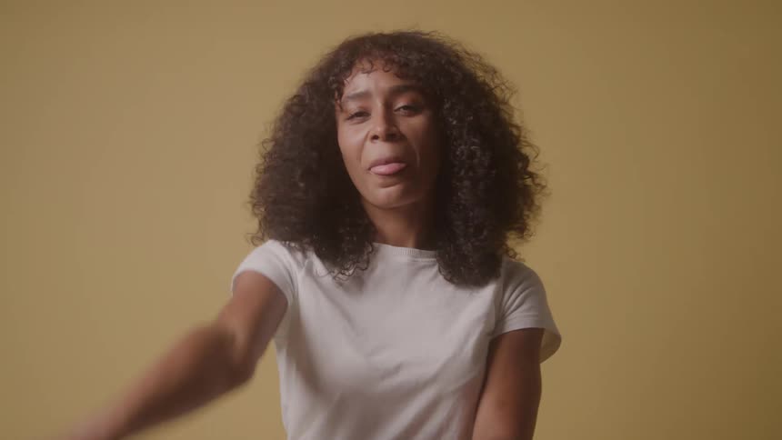 Woman with curly hair making sign language