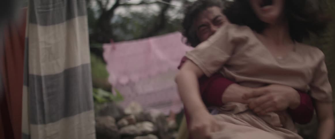 A man grabs a woman fighting
