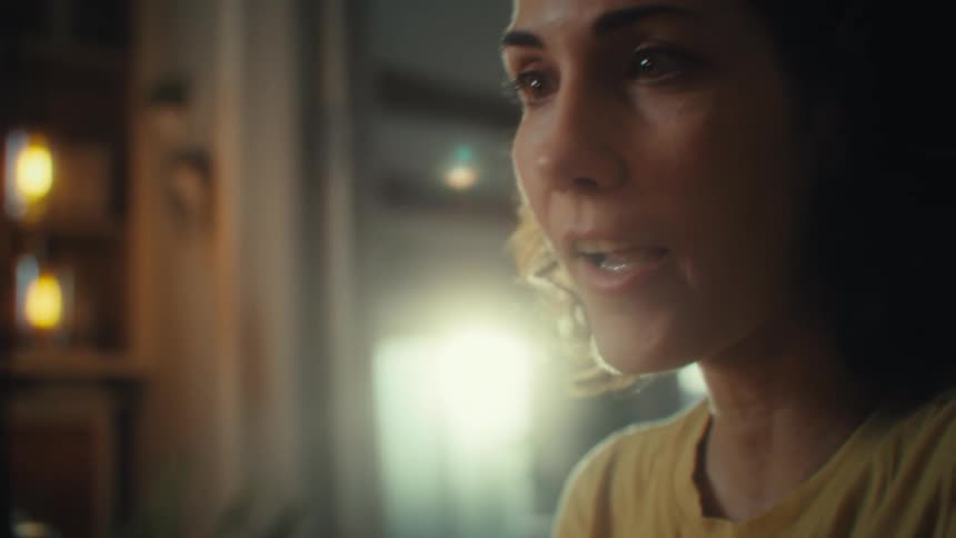 Woman having a conversation while facetiming on cell phone