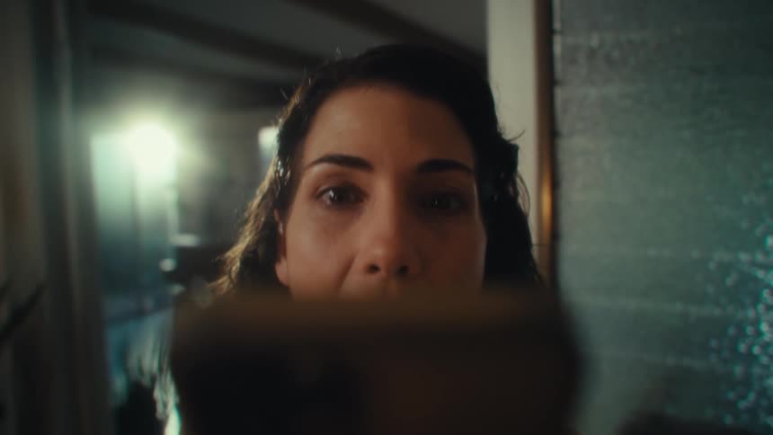 Point of view female waving hello while facetiming on cell phone