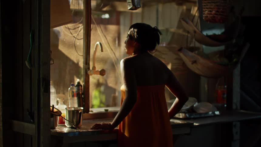 Woman in the kitchen during the day