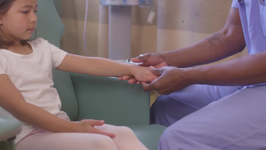 A child is receiving an examination in the hospital