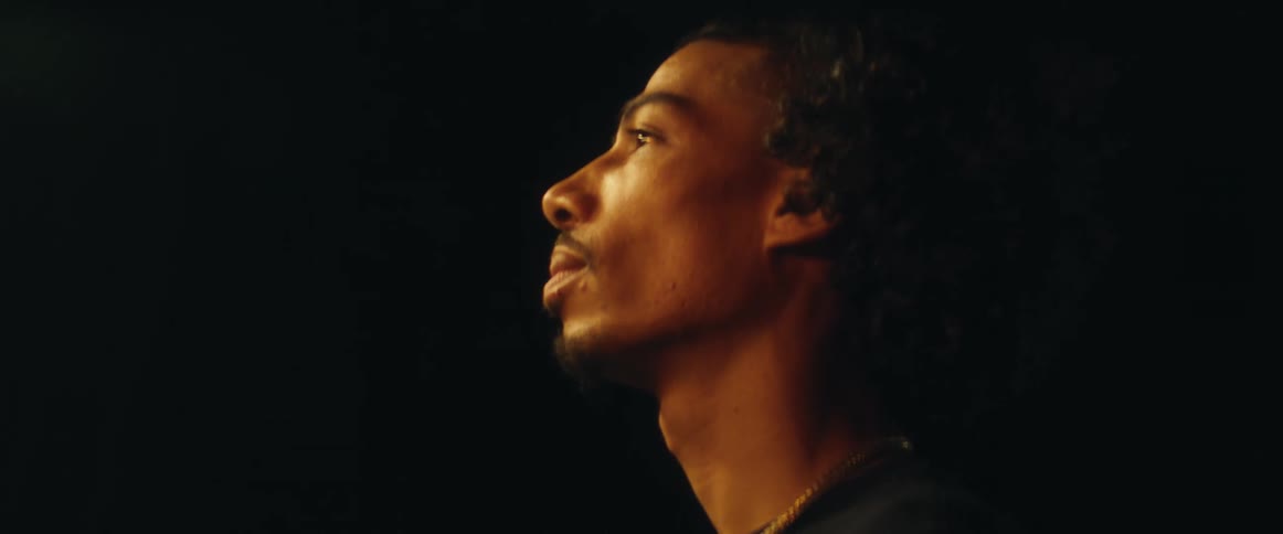 The man is looking up and down