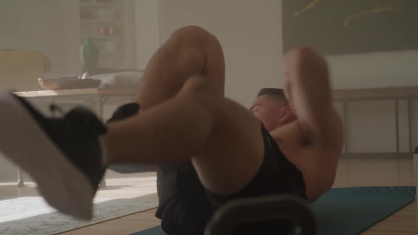 A man is working out at home