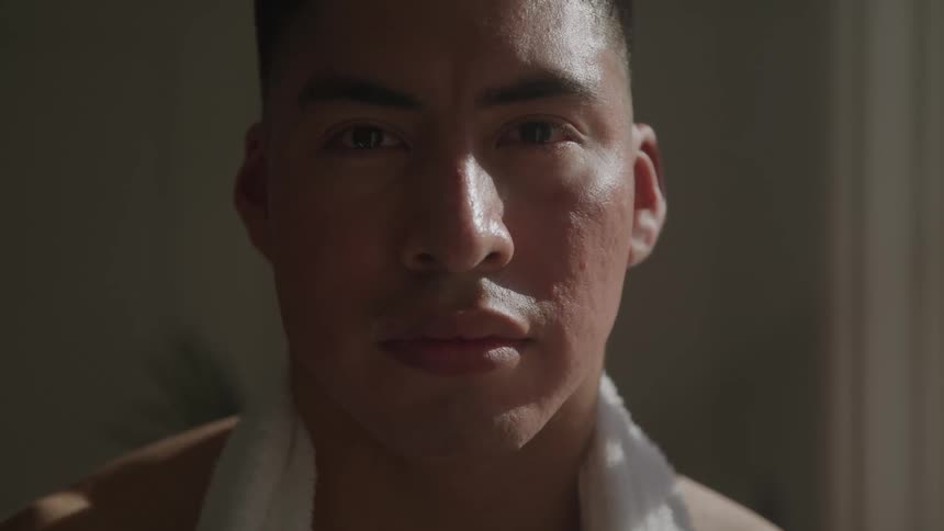 Man with a towel around his neck
