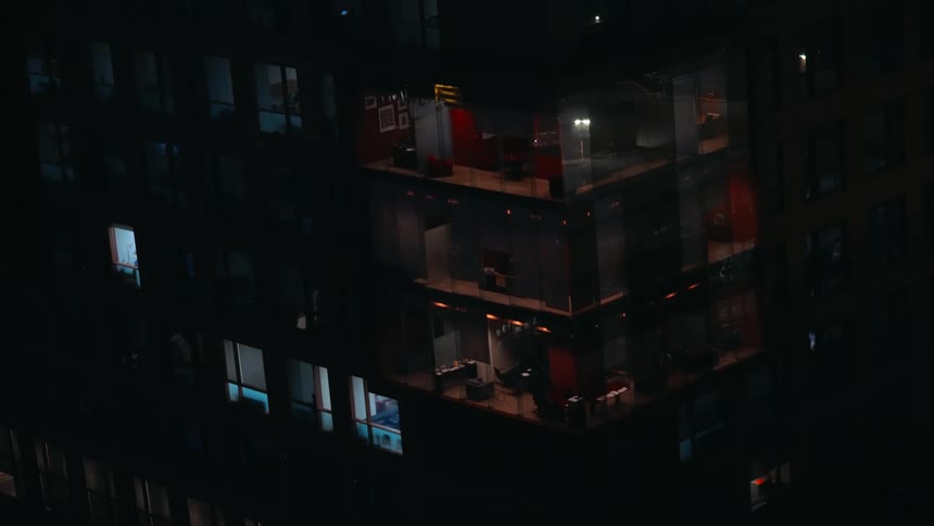 Glass building illuminated at night