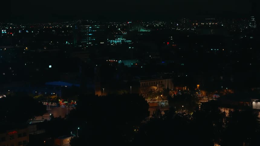 The landscape is full of buildings with lights at night