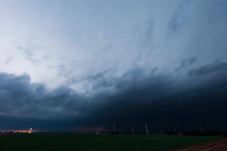Formation of dark clouds signaling a storm over the field
