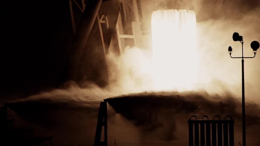 Rocket Launch Liftoff Closeup with Engine Steam and Flames