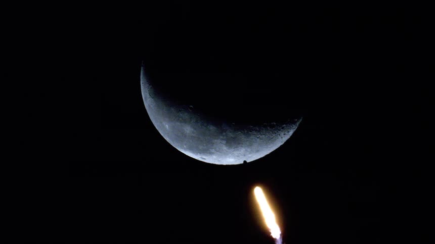 Rocket Launch Transits the Crescent Moon