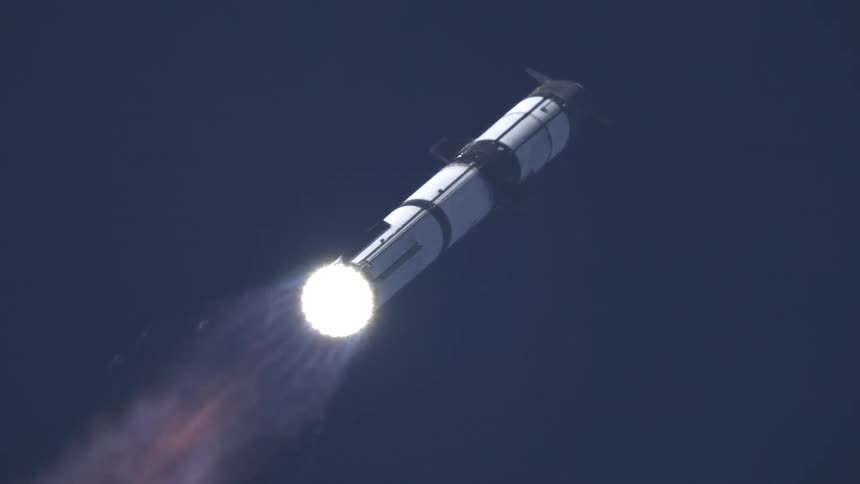Rocket Ascends into theSsky with Bright Exhaust Flames Trailing from its Engines