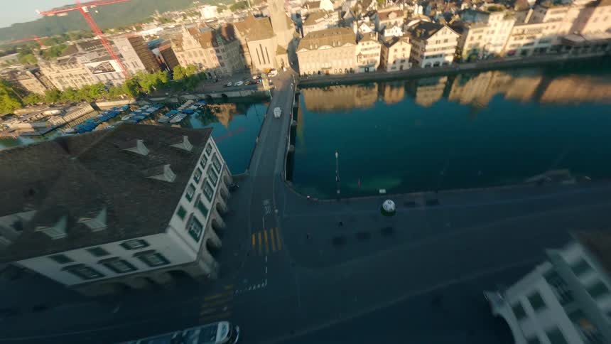 Tilted aerial view of the grossmünster church with lake zurich in the background